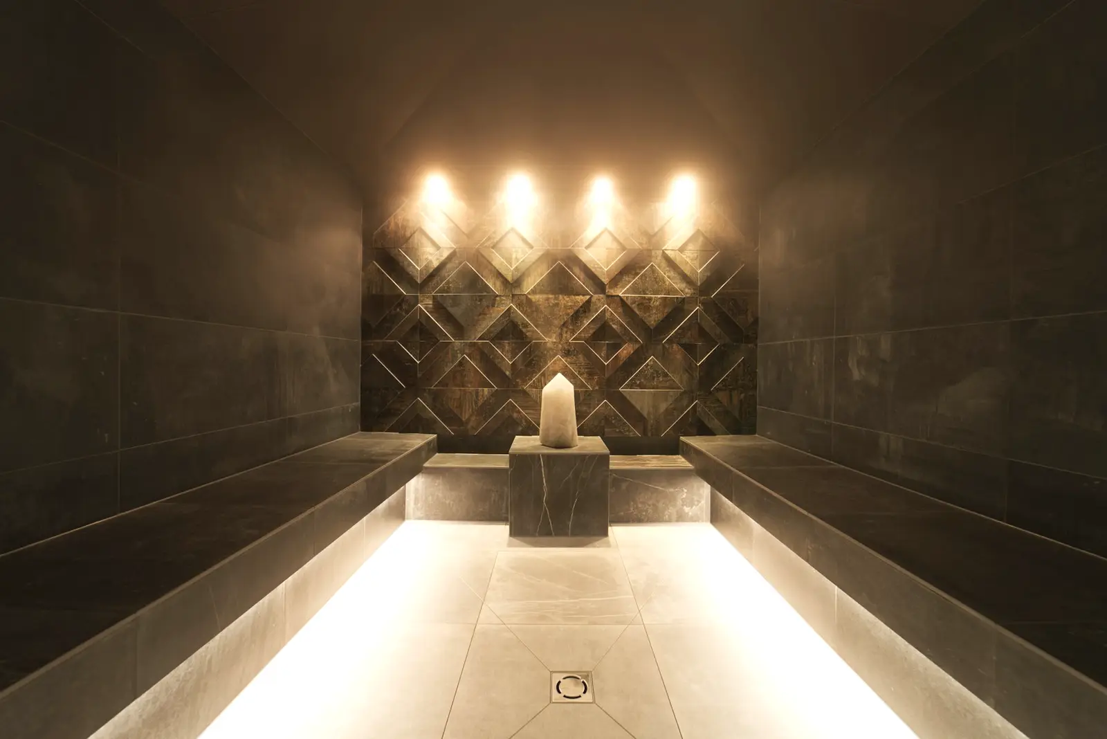 A quiet treatment space arranged for an in-villa wellness session.